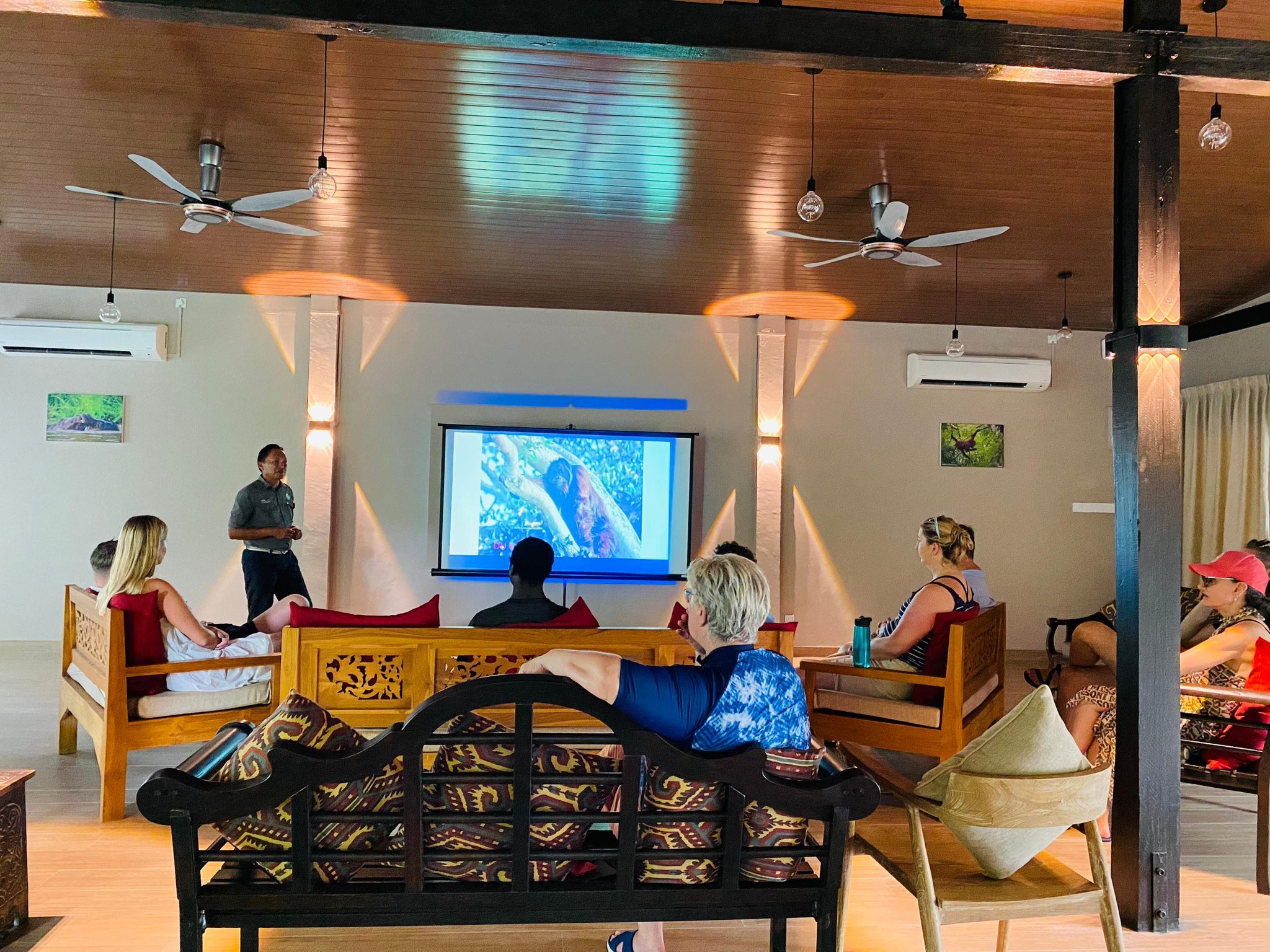 Sukau Rainforest Lodge's naturalist guide giving a talk on orang utans